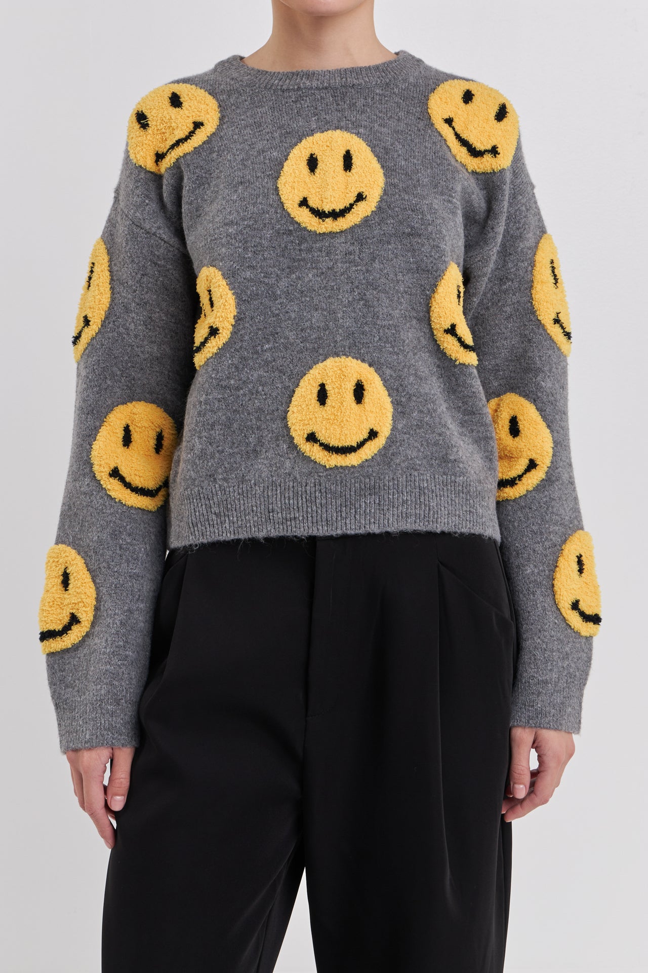 Suéter con cara sonriente