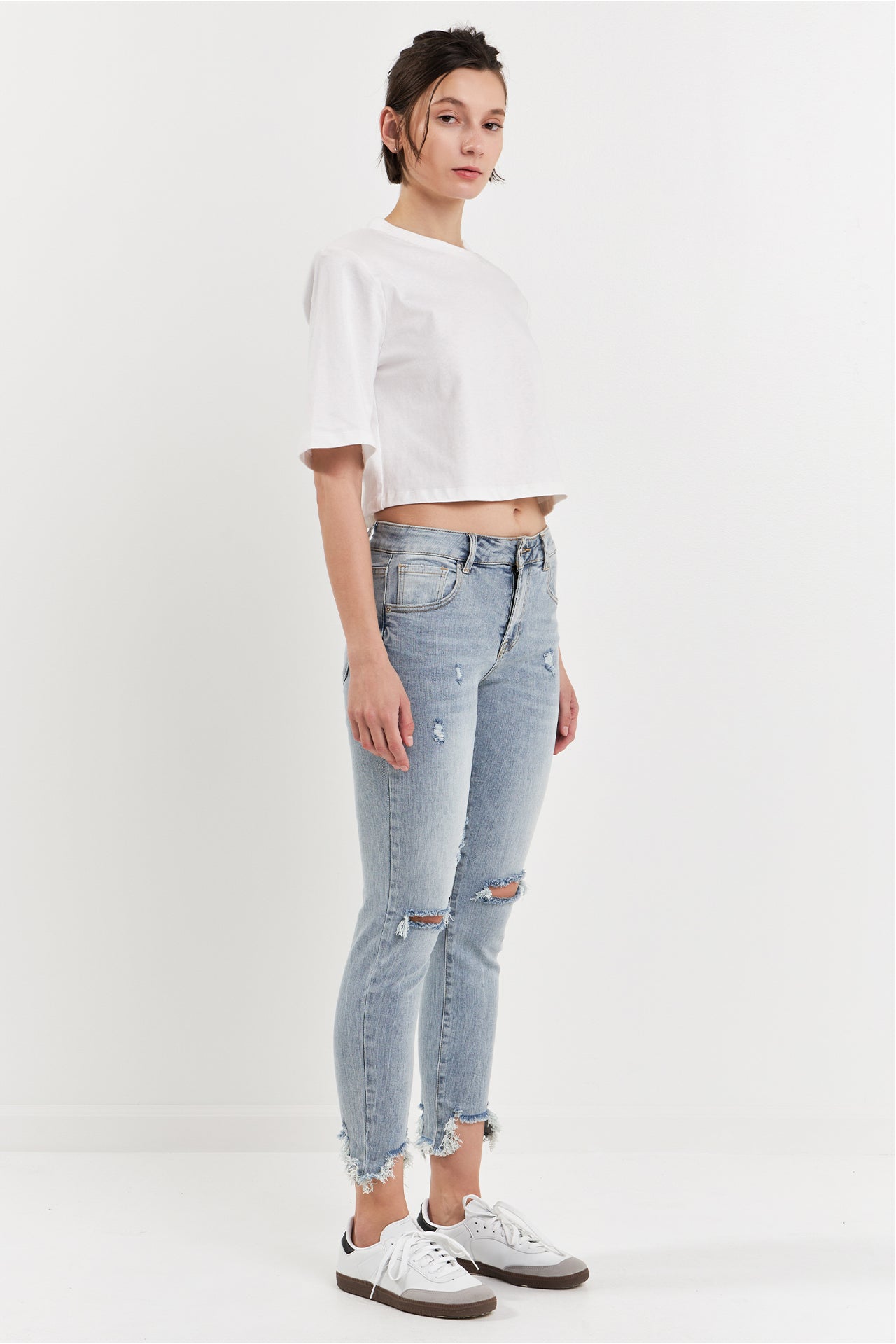 Mid Rise Distressed Ankle Skinny Jeans