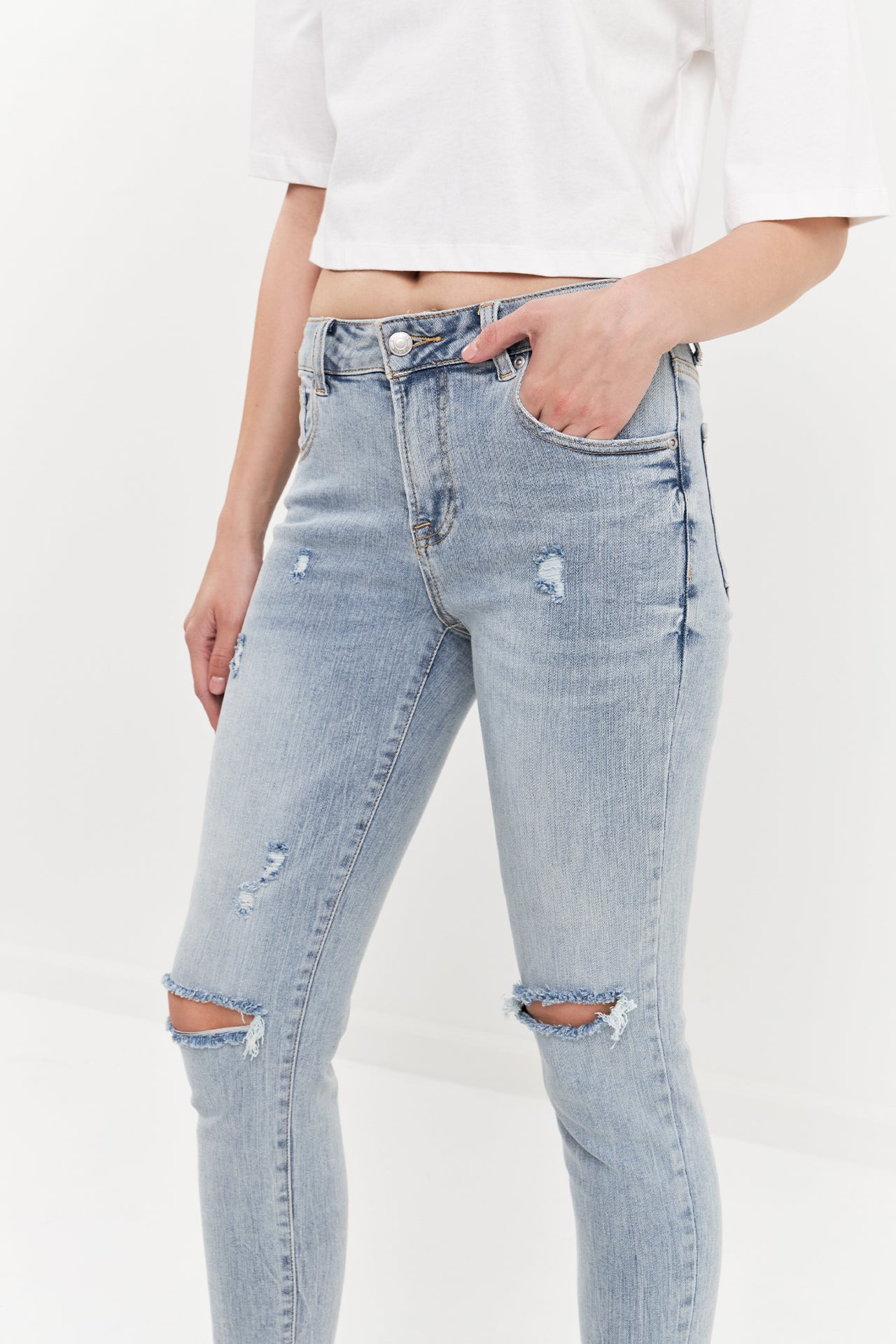 Mid Rise Distressed Ankle Skinny Jeans