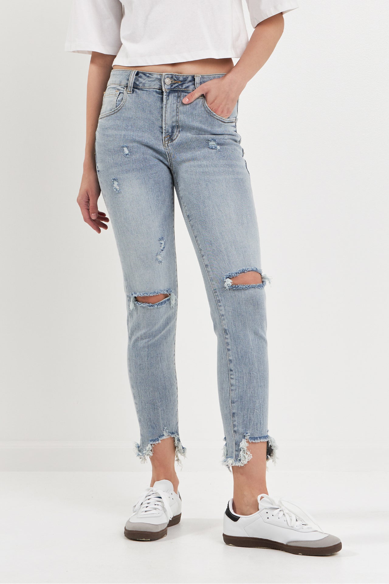 Mid Rise Distressed Ankle Skinny Jeans